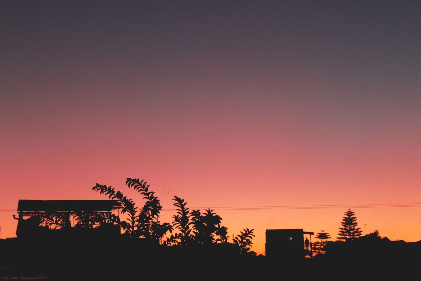 Coucher de soleil sur un village, Madagascar