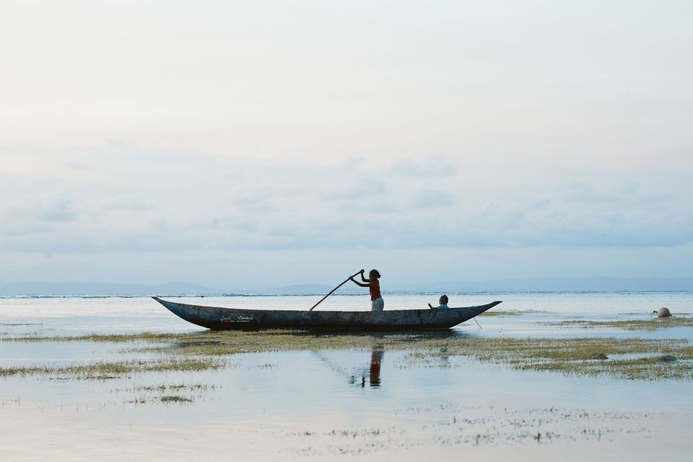 Dugout canoe on shallow water, Madagascar