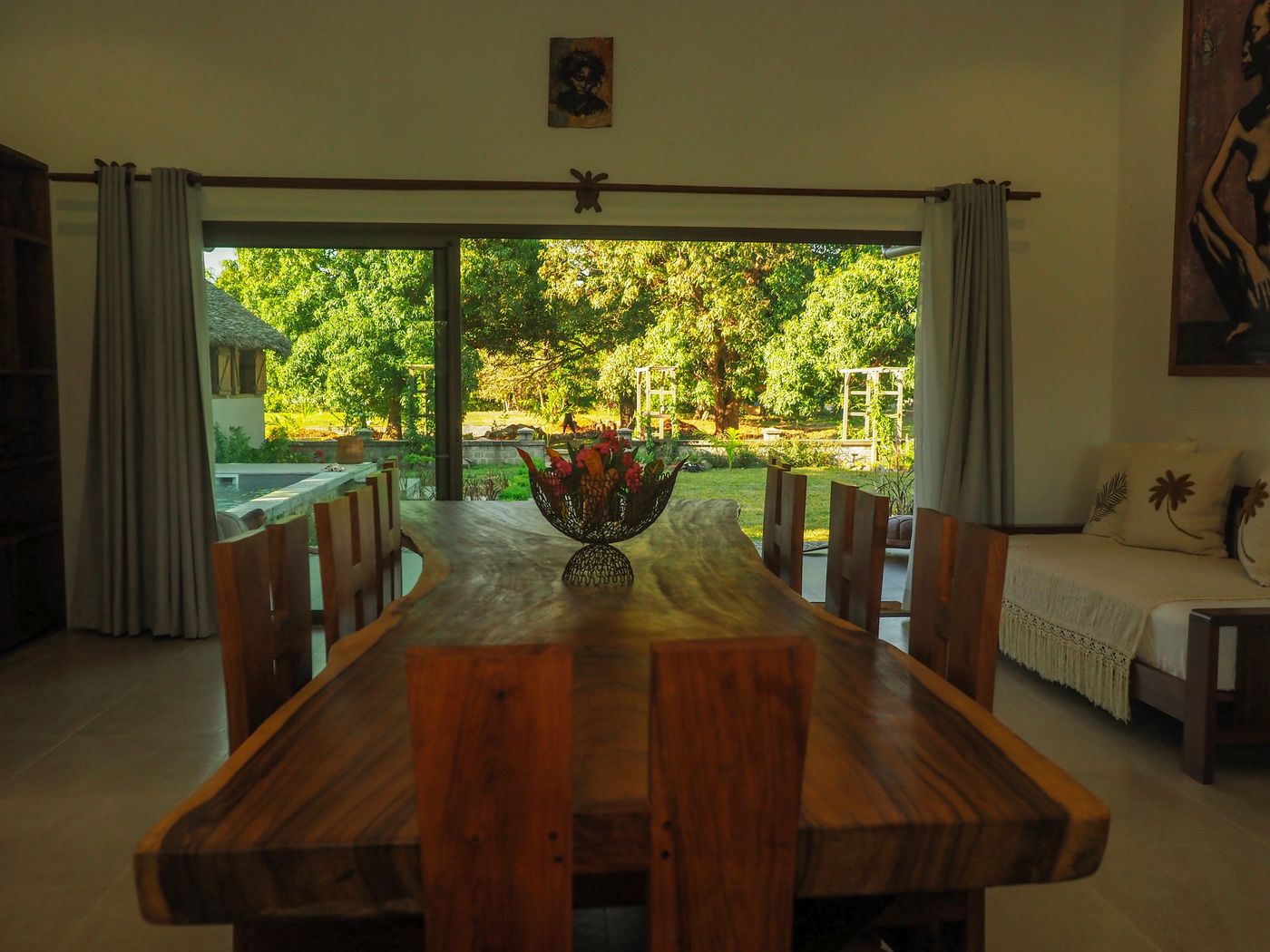 Dining table at a Kokoa Serena villa, open to the garden